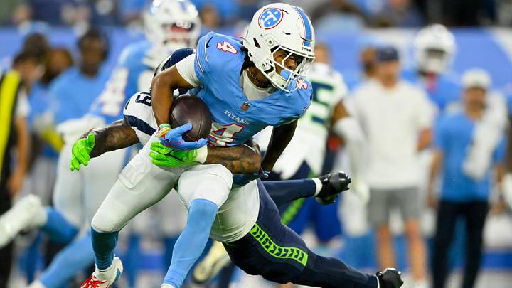Aug 23, 2026; Nashville, Tennessee, USA; Seattle Seahawks linebacker Chris Paul Jr. (49) tackles Tennessee Titans wide receiver Wan'Dale Robinson (4) after a made catch during the first half at Nissan Stadium. Mandatory Credit: Steve Roberts-Imagn Images Aug 23, 2026; Nashville, Tennessee, USA; Seattle Seahawks linebacker Chris Paul Jr. (49) tackles Tennessee Titans wide receiver Wan'Dale Robinson (4) after a made catch during the first half at Nissan Stadium. Mandatory Credit: Steve Roberts-Imagn Images