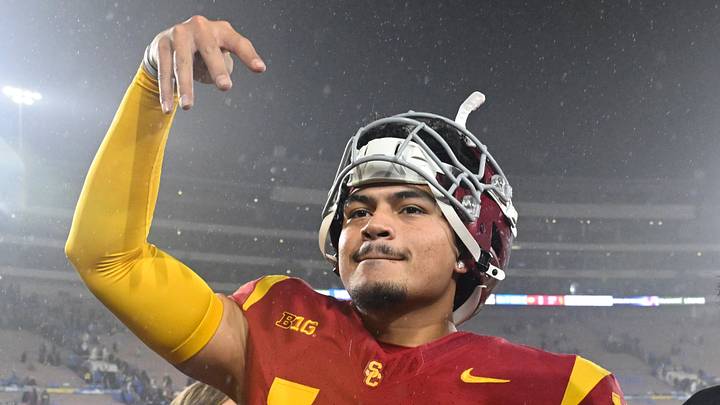 Nov 23, 2024; Pasadena, California, USA; USC Trojans quarterback Jayden Maiava (14) celebrates the win over UCLA at Rose Bowl. Nov 23, 2024; Pasadena, California, USA; USC Trojans quarterback Jayden Maiava (14) celebrates the win over UCLA at Rose Bowl.