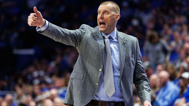 Jan 7, 2026; Lexington, Kentucky, USA; Kentucky Wildcats head coach Mark Pope motions to his players during the second half against the Missouri Tigers at Rupp Arena at Central Bank Center. Mandatory Credit: Jordan Prather-Imagn Images