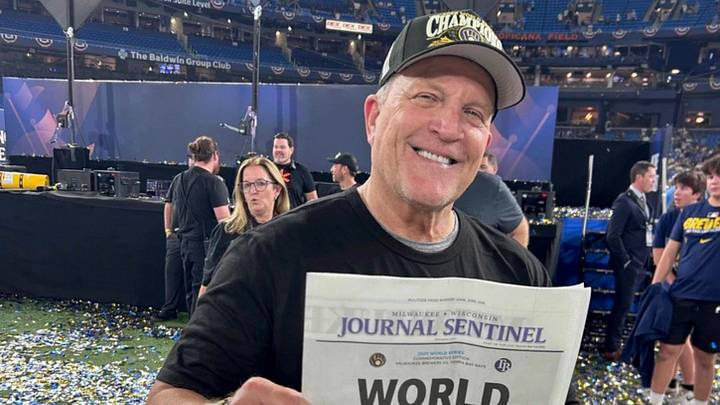 Milwaukee Brewers manager Pat Murphy holds up a Milwaukee Journal Sentinel  “World Champs” newspaper while celebrating  after winning Game 5 and the World Series against the Tampa Bay Rays 4-1 at Tropicana Field in St. Petersburg, Fla. on Oct 28, 2026.