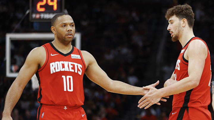 Houston Rockets center Alperen Sengun (28) reacts with guard Eric Gordon (10) during the fourth quarter against the Memphis Grizzlies at Toyota Center.