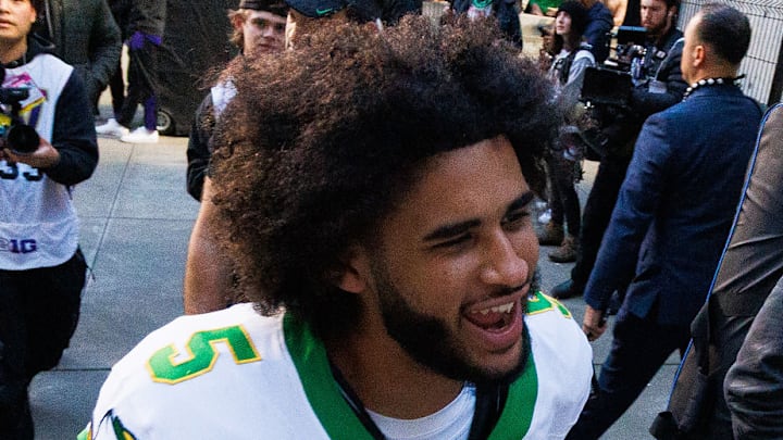 oregon ducks james madison dukes big ten conference dante moore indiana hoosiers fernando mendoza college football playoff oregon ducks james madison dukes big ten conference dante moore indiana hoosiers fernando mendoza college football playoff