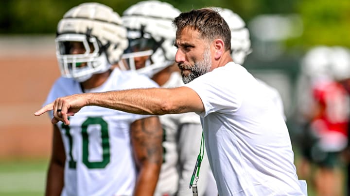 Michigan State's defensive coordinator Joe Rossi works with the defense during the first day of football camp on Tuesday, July 30, 2024, in East Lansing. Michigan State's defensive coordinator Joe Rossi works with the defense during the first day of football camp on Tuesday, July 30, 2024, in East Lansing.