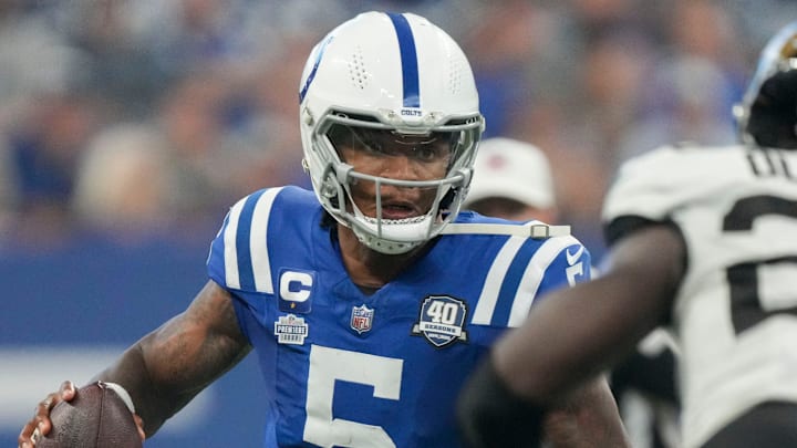 Indianapolis Colts quarterback Anthony Richardson (5) scrambles with the ball as Jacksonville Jaguars linebacker Foyesade Oluokun (23) looks to tackle Sunday, Sept. 10, 2023, during a game against the Jacksonville Jaguars at Lucas Oil Stadium in Indianapolis.