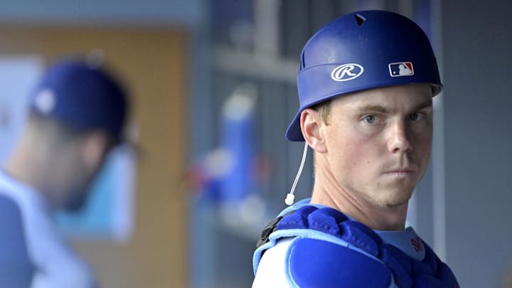 Dodgers catcher Will Smith (16) gets ready in the dugout for the game against the San Diego Padres at Dodger Stadium on June 19.