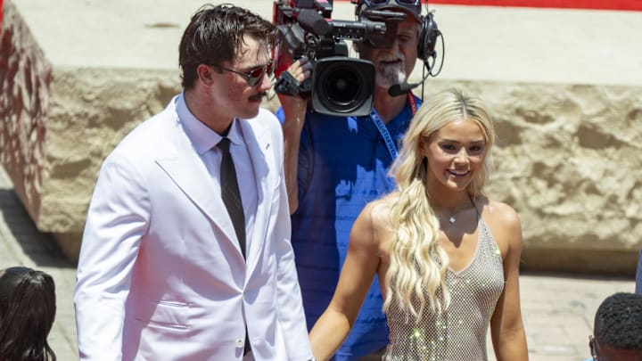 Jul 16, 2024; Arlington, Texas, USA; National League pitcher Paul Skenes of the Pittsburgh Pirates walks the red carpet with his girlfriend LSU gymnast Olivia Livvy Dunne before the 2024 MLB All-Star game at Globe Life Field. Jul 16, 2024; Arlington, Texas, USA; National League pitcher Paul Skenes of the Pittsburgh Pirates walks the red carpet with his girlfriend LSU gymnast Olivia Livvy Dunne before the 2024 MLB All-Star game at Globe Life Field.