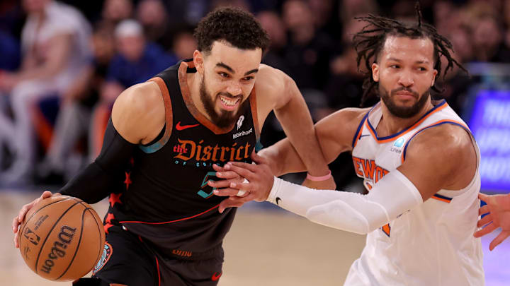 Jan 18, 2024; New York, New York, USA; Washington Wizards guard Tyus Jones (5) drives to the basket against New York Knicks guard Jalen Brunson (11) during the fourth quarter at Madison Square Garden. Mandatory Credit: Brad Penner-Imagn Images