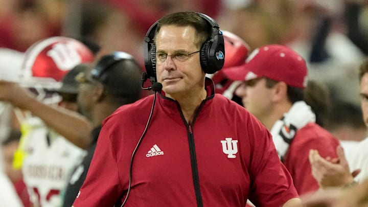 Indiana Hoosiers head coach Curt Cignetti walks the sideline Sunday, Dec. 7, 2025, during the Big Ten football championship against the Ohio State Buckeyes at Lucas Oil Stadium in Indianapolis. Indiana Hoosiers head coach Curt Cignetti walks the sideline Sunday, Dec. 7, 2025, during the Big Ten football championship against the Ohio State Buckeyes at Lucas Oil Stadium in Indianapolis.