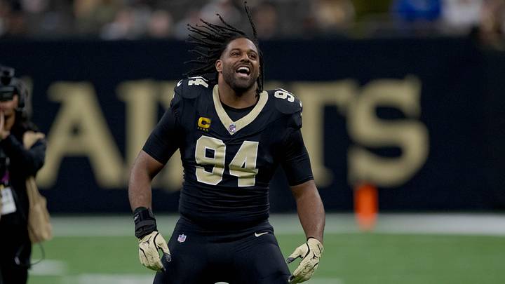 Dec 29, 2024; New Orleans, Louisiana, USA; New Orleans Saints defensive end Cameron Jordan (94) does the “Who Dat?” chant before a game against the Las Vegas Raiders at Caesars Superdome. Mandatory Credit: Matthew Hinton-Imagn Images Dec 29, 2024; New Orleans, Louisiana, USA; New Orleans Saints defensive end Cameron Jordan (94) does the “Who Dat?” chant before a game against the Las Vegas Raiders at Caesars Superdome. Mandatory Credit: Matthew Hinton-Imagn Images