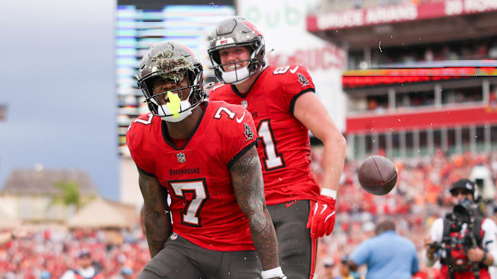 Dec 29, 2024; Tampa, Florida, USA; Tampa Bay Buccaneers running back Bucky Irving (7) celebrates after scoring a touchdown against the Carolina Panthers in the second quarter at Raymond James Stadium. Mandatory Credit: Nathan Ray Seebeck-Imagn Images Dec 29, 2024; Tampa, Florida, USA; Tampa Bay Buccaneers running back Bucky Irving (7) celebrates after scoring a touchdown against the Carolina Panthers in the second quarter at Raymond James Stadium. Mandatory Credit: Nathan Ray Seebeck-Imagn Images