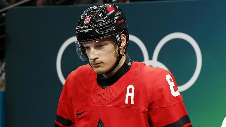 Feb 18, 2026; Milan, Italy; Cale Makar of Canada walks out to the ice before a men's ice hockey quarterfinal during the Milano Cortina 2026 Olympic Winter Games at Milano Santagiulia Ice Hockey Arena. Mandatory Credit: Geoff Burke-Imagn Images