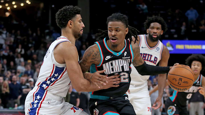 Grizzlies guard Ja Morant drives to the basket against 76ers guard Quentin Grimes during a game last month.