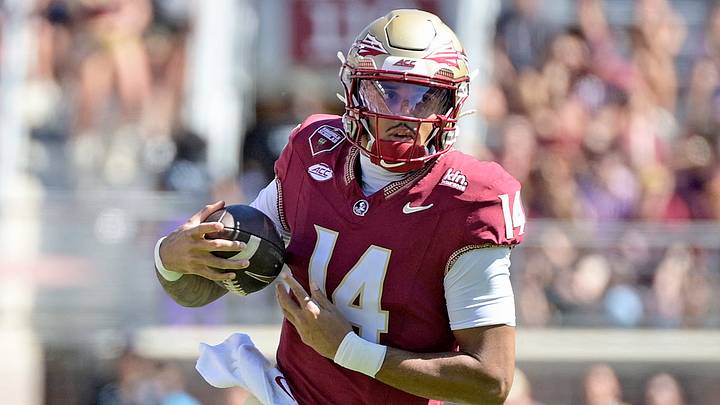 Sep 26, 2026; Tallahassee, Florida, USA;  Florida State Seminoles quarterback Ashton Daniels (14) runs during the first quarter against the Central Arkansas Bears at Doak S. Campbell Stadium.  Mandatory Credit: Melina Myers-Imagn Images