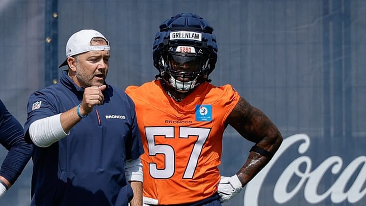 Jul 24, 2025; Englewood, CO, USA; Denver Broncos inside linebackers coach Jeff Schmedding with linebackers Levelle Bailey (56), Justin Strnad (40), Drew Sanders (41), Dre Greenlaw (57), and Alex Singleton (49) during Denver Broncos Training Camp