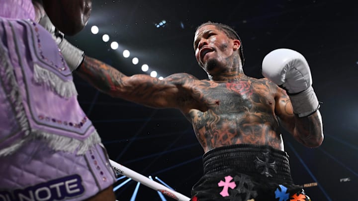 Gervonta "Tank" Davis looks to land a left hand on Frank Martin. Gervonta "Tank" Davis looks to land a left hand on Frank Martin.