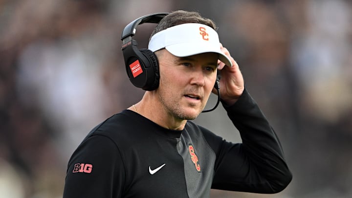Sep 13, 2025; West Lafayette, Indiana, USA; Southern California Trojans head coach Lincoln Riley stands on the sidelines during the first quarter against the Purdue Boilermakers at Ross-Ade Stadium. Mandatory Credit: Marc Lebryk-Imagn Images
