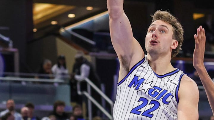 Apr 8, 2026; Orlando, Florida, USA; Orlando Magic forward Franz Wagner (22) goes to the basket against Minnesota Timberwolves forward Julian Phillips (4) during the second half at Kia Center. Mandatory Credit: Mike Watters-Imagn Images