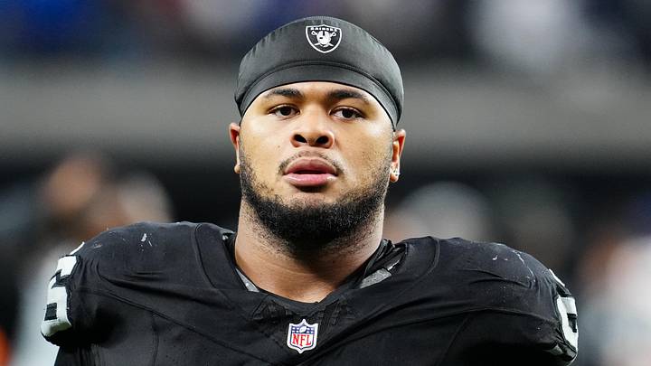 Las Vegas Raiders defensive tackle Jonah Laulu exits the field after the game against the New York Giants in 2025.