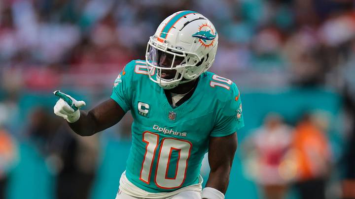 Dec 22, 2024; Miami Gardens, Florida, USA; Miami Dolphins wide receiver Tyreek Hill (10) signals from the line of scrimmage against the San Francisco 49ers during the second quarter at Hard Rock Stadium. Mandatory Credit: Sam Navarro-Imagn Images Dec 22, 2024; Miami Gardens, Florida, USA; Miami Dolphins wide receiver Tyreek Hill (10) signals from the line of scrimmage against the San Francisco 49ers during the second quarter at Hard Rock Stadium. Mandatory Credit: Sam Navarro-Imagn Images