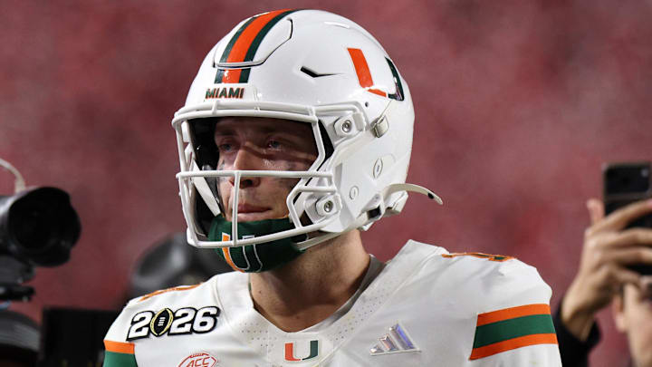 Jan 19, 2026; Miami Gardens, FL, USA; Miami Hurricanes quarterback Carson Beck (11) reacts after the College Football Playoff National Championship game at Hard Rock Stadium. Mandatory Credit: Nathan Ray Seebeck-Imagn Images
