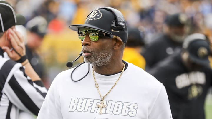 Nov 8, 2025; Morgantown, West Virginia, USA; Colorado Buffaloes head coach Deion Sanders walks along the sidelines late in the fourth quarter against the West Virginia Mountaineers at Milan Puskar Stadium. Mandatory Credit: Ben Queen-Imagn Images