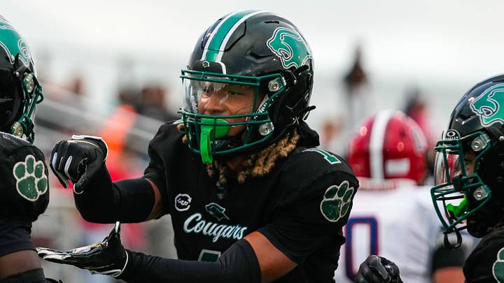 Westland's Emoni Smith (1) celebrates a play. Westland's Emoni Smith (1) celebrates a play.