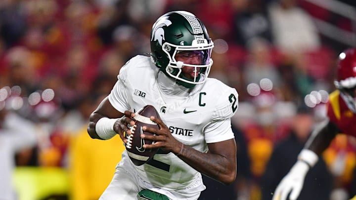 Sep 20, 2025; Los Angeles, California, USA; Michigan State Spartans quarterback Aidan Chiles (2) moves out to pass against the Southern California Trojans during the first half at the Los Angeles Memorial Coliseum.