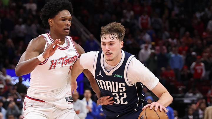 Jan 31, 2026; Houston, Texas, USA; Dallas Mavericks forward Cooper Flagg (32) drives with the ball as Houston Rockets guard Amen Thompson (1) defends during the fourth quarter at Toyota Center. Mandatory Credit: Troy Taormina-Imagn Images Jan 31, 2026; Houston, Texas, USA; Dallas Mavericks forward Cooper Flagg (32) drives with the ball as Houston Rockets guard Amen Thompson (1) defends during the fourth quarter at Toyota Center. Mandatory Credit: Troy Taormina-Imagn Images
