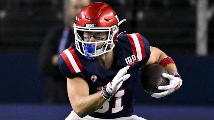 Jan 30, 2025; Arlington, TX, USA; East wide receiver Efton Chism of Eastern Washington (81) runs with the ball during the first half against the West at AT&T Stadium. Mandatory Credit: Jerome Miron-Imagn Images
