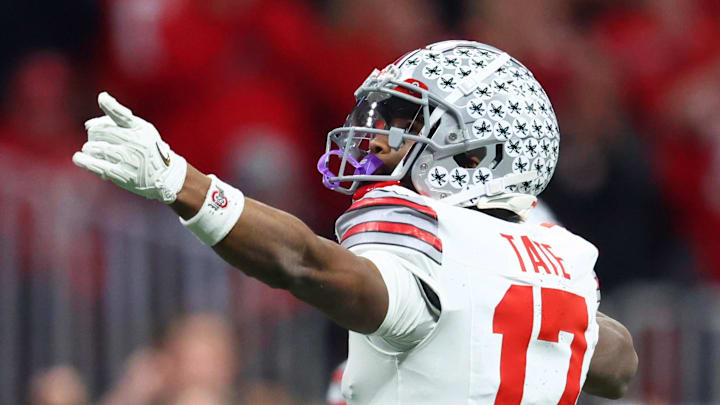 Jan 20, 2025; Atlanta, GA, USA; Ohio State Buckeyes wide receiver Carnell Tate (17) reacts after a play against the Notre Dame Fighting Irish during the first half the CFP National Championship college football game at Mercedes-Benz Stadium. Mandatory Credit: Mark J. Rebilas-Imagn Images
