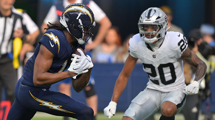Nov 30, 2025; Inglewood, California, USA; Los Angeles Chargers wide receiver Quentin Johnston (1) makes a touchdown catch against the Las Vegas Raiders during the first half at SoFi Stadium. Mandatory Credit: Jayne Kamin-Oncea-Imagn Images Nov 30, 2025; Inglewood, California, USA; Los Angeles Chargers wide receiver Quentin Johnston (1) makes a touchdown catch against the Las Vegas Raiders during the first half at SoFi Stadium. Mandatory Credit: Jayne Kamin-Oncea-Imagn Images