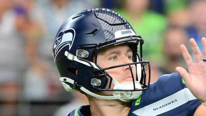 Seattle Seahawks quarterback Drew Lock throws a touchdown pass