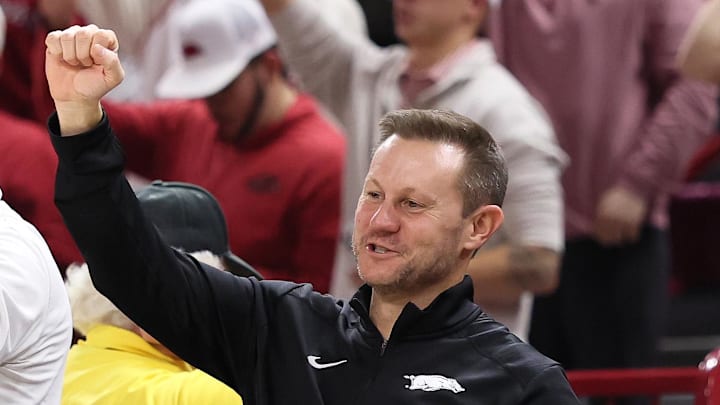Arkansas Razorbacks coach Ryan Silverfield “Calls the Hogs” during the second half against the James Madison Dukes at Bud Walton Arena. Arkansas won 103-74.