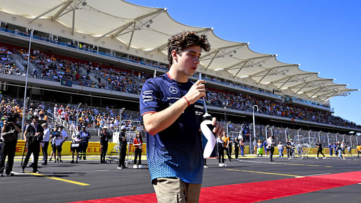 Oct 20, 2024; Austin, Texas, USA; Williams Racing driver Franco Colapinto (43) of Team Argentina walks back to the paddock after the driver’s parade before the 2024 Formula One US Grand Prix at Circuit of the Americas. Mandatory Credit: Jerome Miron-Imagn Images
