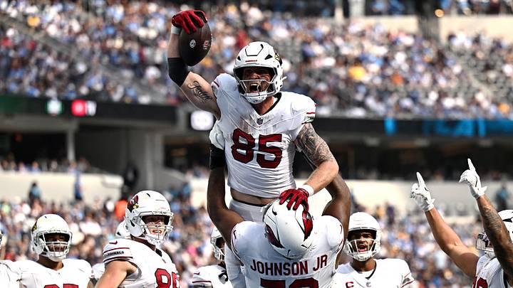 Sep 13, 2026; Inglewood, California, USA; Arizona Cardinals tight end Trey McBride (85) is lifted in the air by. offensive line Paris Johnson Jr. (70) after catching a touchdown against the Los Angeles Chargers during the fourth quarter at SoFi Stadium. Mandatory Credit: William Liang-Imagn Images Sep 13, 2026; Inglewood, California, USA; Arizona Cardinals tight end Trey McBride (85) is lifted in the air by. offensive line Paris Johnson Jr. (70) after catching a touchdown against the Los Angeles Chargers during the fourth quarter at SoFi Stadium. Mandatory Credit: William Liang-Imagn Images