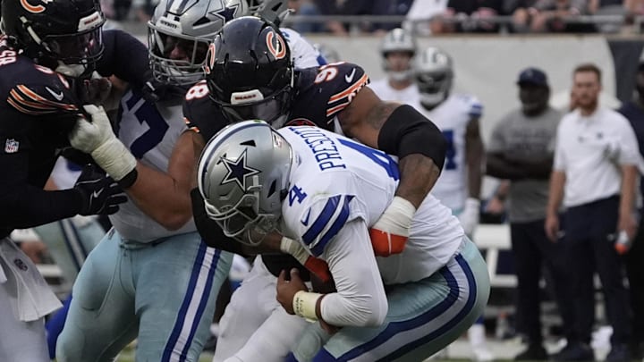 Chicago Bears defensive end Montez Sweat (98) sacks Dallas Cowboys quarterback Dak Prescott (4) during the second half at Soldier Field.