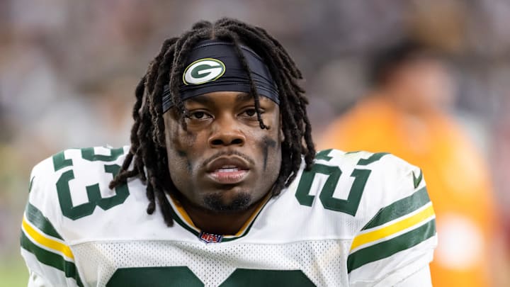Oct 19, 2025; Glendale, Arizona, USA; Green Bay Packers running back Emanuel Wilson (23) against the Arizona Cardinals at State Farm Stadium. Mandatory Credit: Mark J. Rebilas-Imagn Images