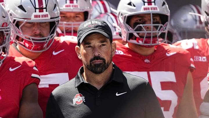 Ohio State Buckeyes head coach Ryan Day leads his team onto the field prior to the NCAA football game against the Texas Longhorns at Ohio Stadium on Aug. 30, 2025.