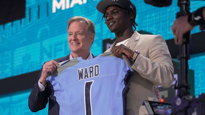 Cam Ward, QB, from Miami holds a jersey with NFL Commissioner Roger Goodell after being selected 1st overall by the Tennessee Titans during the first round of the 2025 NFL Draft at Lambeau Field on April 24, 2025 in Green Bay, Wisconsin. Cam Ward, QB, from Miami holds a jersey with NFL Commissioner Roger Goodell after being selected 1st overall by the Tennessee Titans during the first round of the 2025 NFL Draft at Lambeau Field on April 24, 2025 in Green Bay, Wisconsin.