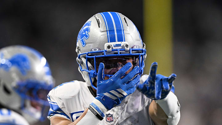 Dec 4, 2025; Detroit, Michigan, USA; Detroit Lions wide receiver Amon-Ra St. Brown (14) celebrates after a play during the first half against the Dallas Cowboys at Ford Field. Mandatory Credit: Lon Horwedel-Imagn Images