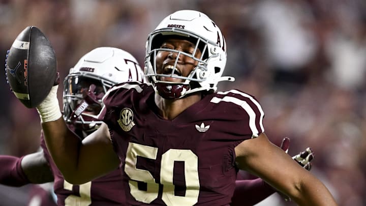 Oct 11, 2025; College Station, Texas, USA; Texas A&M Aggies defensive end Dayon Hayes (50) celebrates after recovering a fumble during the fourth quarter against the Florida Gators at Kyle Field. Mandatory Credit: Maria Lysaker-Imagn Images 