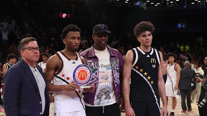 Apr 1, 2025; Brooklyn, NY, USA; McDonald's All American West guard Darryn Peterson (22) and McDonald's All American East forward Cameron Boozer (12) pose for photos after the game at Barclays Center. Mandatory Credit: Pamela Smith-Imagn Images