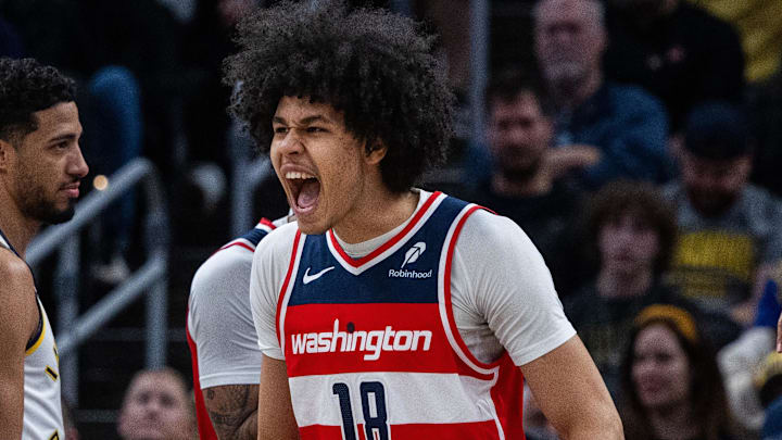 Apr 8, 2025; Indianapolis, Indiana, USA; Washington Wizards forward Kyshawn George (18) celebrates a made basket in the first half against the Indiana Pacers at Gainbridge Fieldhouse. Mandatory Credit: Trevor Ruszkowski-Imagn Images