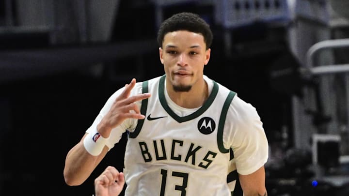 Milwaukee Bucks guard Ryan Rollins (13) reacts after scoring a 3-point basket in the 3rd quarter against the New York Knicks at Fiserv Forum on October 28, 2025.