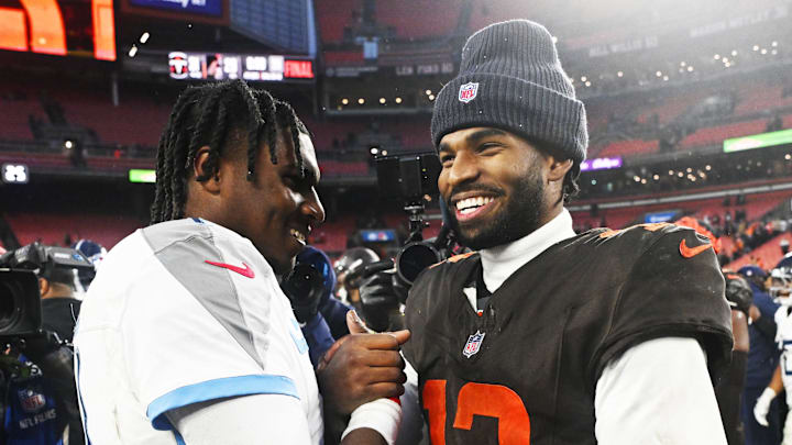 Dec 7, 2025; Cleveland, Ohio, USA; Cleveland Browns quarterback Shedeur Sanders (12) shakes hands with Tennessee Titans quarterback Cam Ward (1) after the game at Huntington Bank Field. Mandatory Credit: Ken Blaze-Imagn Images Dec 7, 2025; Cleveland, Ohio, USA; Cleveland Browns quarterback Shedeur Sanders (12) shakes hands with Tennessee Titans quarterback Cam Ward (1) after the game at Huntington Bank Field. Mandatory Credit: Ken Blaze-Imagn Images