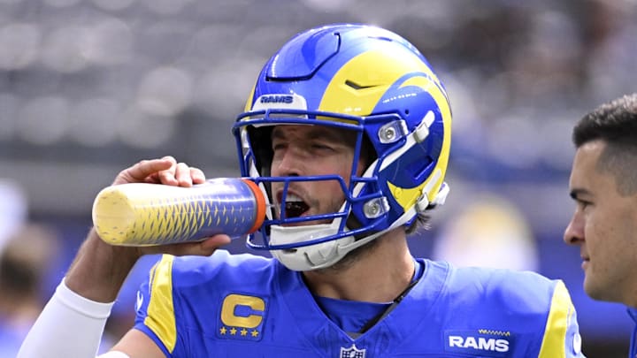 Oct 20, 2024; Inglewood, California, USA; Los Angeles Rams quarterback Matthew Stafford (9) takes a drink during warmups before a game against the Las Vegas Raiders at SoFi Stadium. Mandatory Credit: Alex Gallardo-Imagn Images