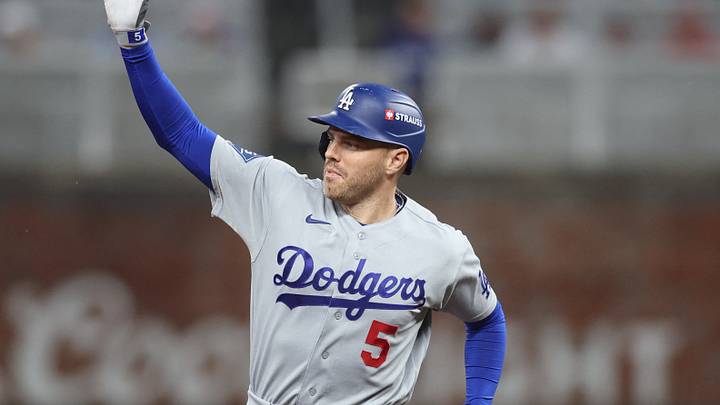 Oct 6, 2026; Cumberland, Georgia, USA;  Los Angeles Dodgers first baseman Freddie Freeman (5) reacts as he circles the bases after hitting a solo home run during the fourth inning against the Atlanta Braves at Truist Park.  Mandatory Credit: Brett Davis-Imagn Images