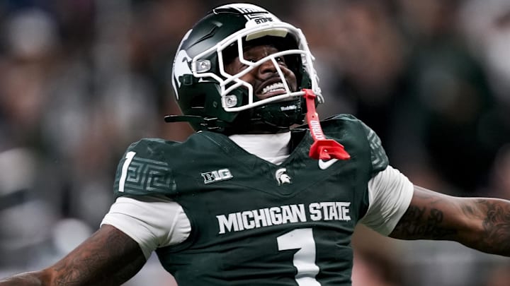 Nov 29, 2025; Detroit, Michigan, USA; Michigan State wide receiver Omari Kelly (1) celebrates a first down run against Maryland in the second quarter at Ford Field. Mandatory Credit: Brendan Mullin-Imagn Images