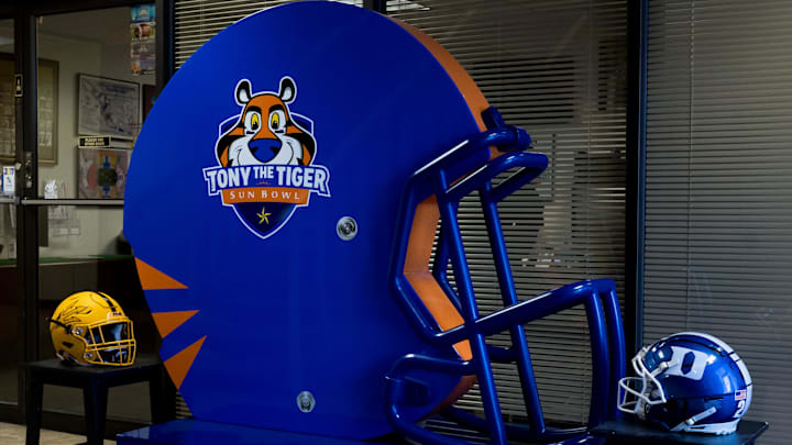 Arizona State and Duke football helmets sit outside the Sun Bowl Association offices in West El Paso on Wednesday, Dec. 18, 2025.