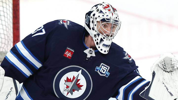 Apr 6, 2026; Winnipeg, Manitoba, CAN; Winnipeg Jets goaltender Connor Hellebuyck (37) warms up before a game against the Seattle Kraken at Canada Life Centre. Mandatory Credit: James Carey Lauder-Imagn Images